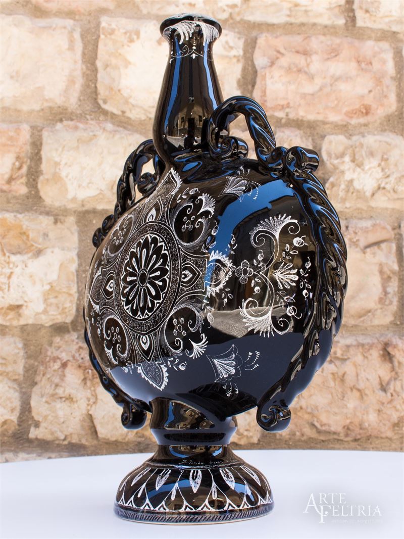 Bottiglia nera con manici