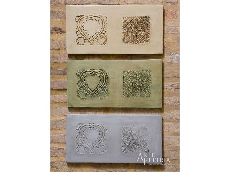 Formella rettangolare con stella e cuore