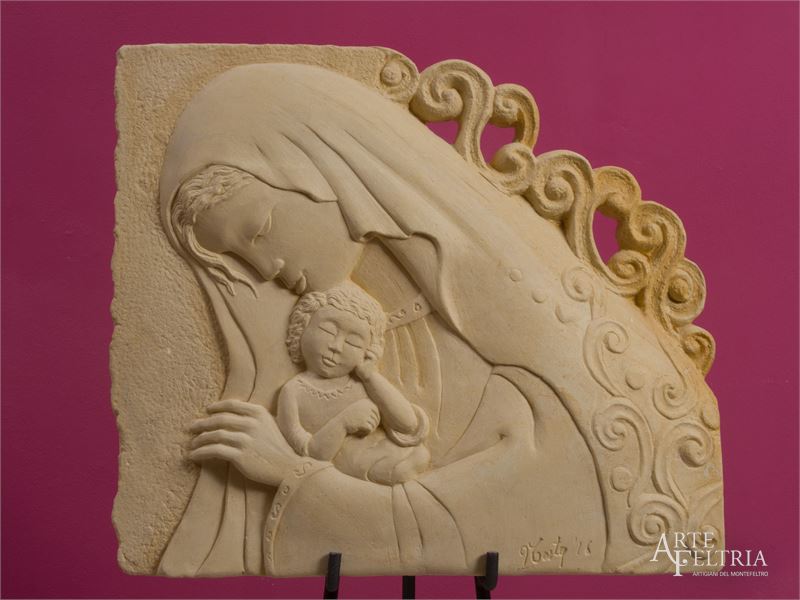 Madonna con Bambino e riccioli d'oro |bassorilievo