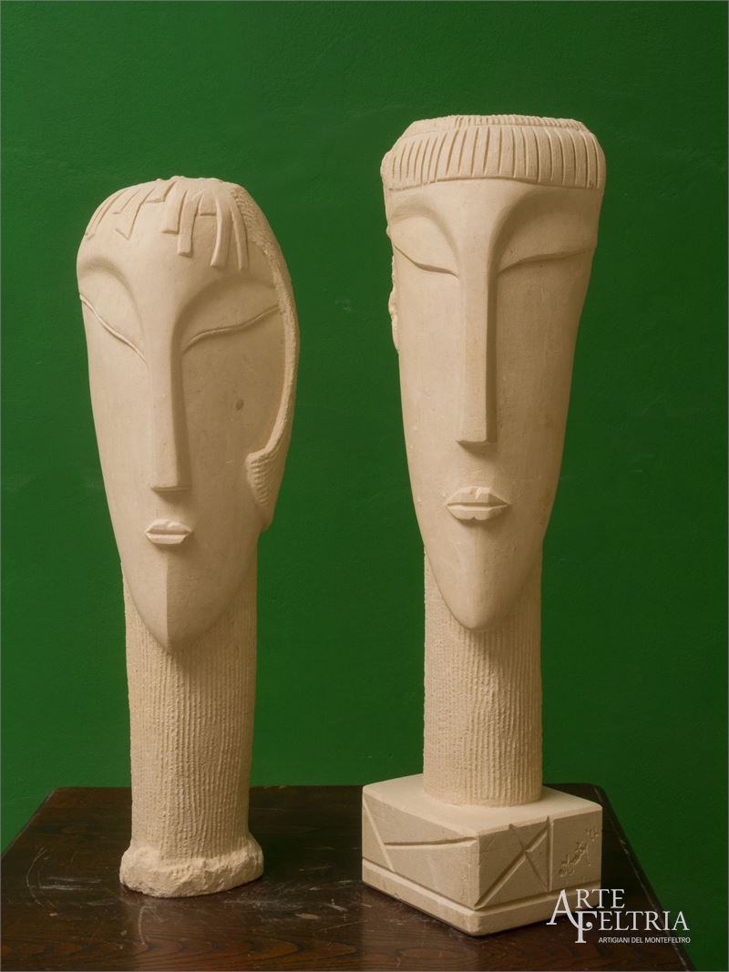 Coppia di volti |scultura